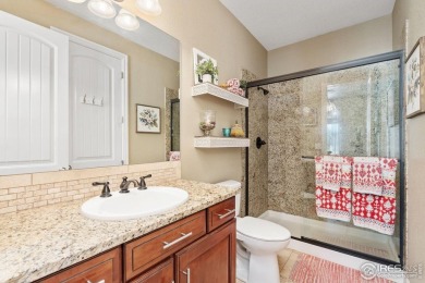 This two-story gem is a total showstopper! Located in the on Pelican Lakes Golf and Country Club in Colorado - for sale on GolfHomes.com, golf home, golf lot