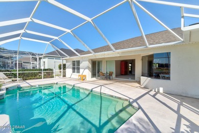 This stunning 3-bedroom plus den/office , 2-bath home is located on Spruce Creek Golf Club in Florida - for sale on GolfHomes.com, golf home, golf lot