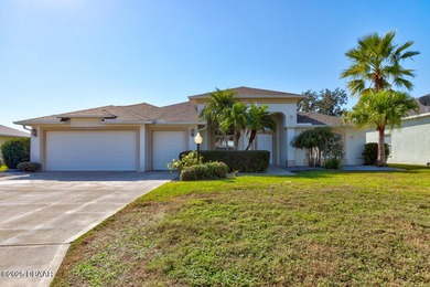 This stunning 3-bedroom plus den/office , 2-bath home is located on Spruce Creek Golf Club in Florida - for sale on GolfHomes.com, golf home, golf lot