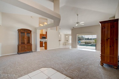 This stunning 3-bedroom plus den/office , 2-bath home is located on Spruce Creek Golf Club in Florida - for sale on GolfHomes.com, golf home, golf lot