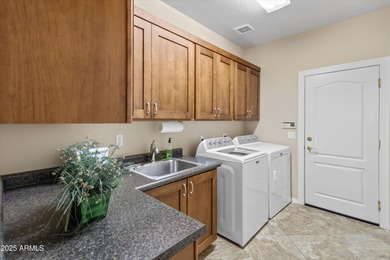 This exceptional single-level Monterey-style home in the on Starfire At Scottsdale Country Club in Arizona - for sale on GolfHomes.com, golf home, golf lot