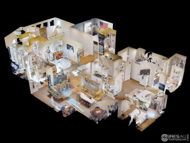 This two-story gem is a total showstopper! Located in the on Pelican Lakes Golf and Country Club in Colorado - for sale on GolfHomes.com, golf home, golf lot