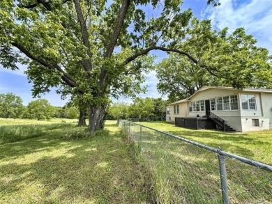 Welcome to this completely renovated 3-bedroom, 2-bathroom home on Pecan Valley Golf Course in Oklahoma - for sale on GolfHomes.com, golf home, golf lot