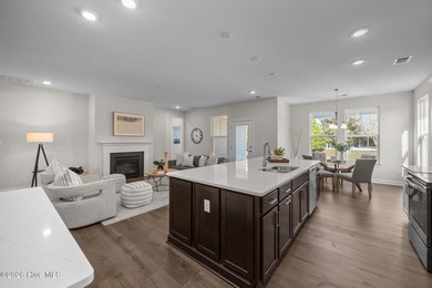 Stylish one-level home in a resort-style community featuring an on Sound Golf Links at Albemarle Plantation in North Carolina - for sale on GolfHomes.com, golf home, golf lot