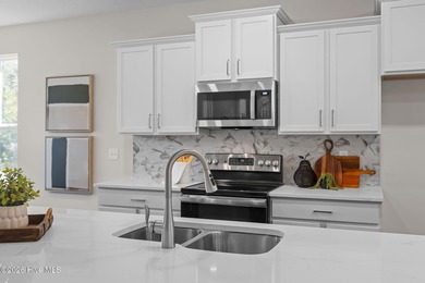 Stylish one-level home in a resort-style community featuring an on Sound Golf Links at Albemarle Plantation in North Carolina - for sale on GolfHomes.com, golf home, golf lot