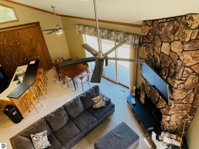 Stylish & spacious contemporary home overlooking popular Summit on Shanty Creek Golf Course in Michigan - for sale on GolfHomes.com, golf home, golf lot