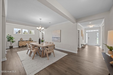 Stylish one-level home in a resort-style community featuring an on Sound Golf Links at Albemarle Plantation in North Carolina - for sale on GolfHomes.com, golf home, golf lot