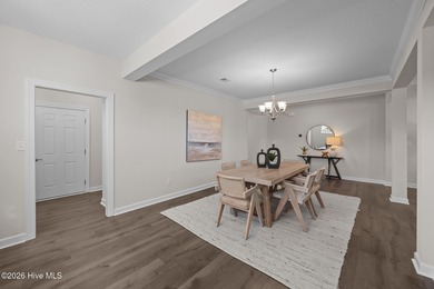 Stylish one-level home in a resort-style community featuring an on Sound Golf Links at Albemarle Plantation in North Carolina - for sale on GolfHomes.com, golf home, golf lot