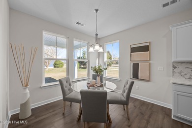 Stylish one-level home in a resort-style community featuring an on Sound Golf Links at Albemarle Plantation in North Carolina - for sale on GolfHomes.com, golf home, golf lot