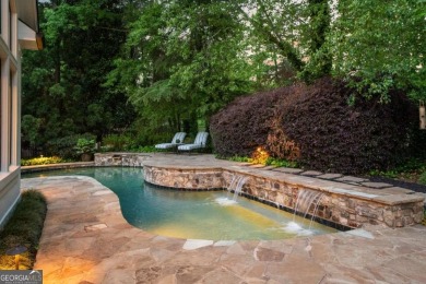 Tucked into a quiet cul-de-sac street within one of Suwanee's on Laurel Springs Golf Club in Georgia - for sale on GolfHomes.com, golf home, golf lot