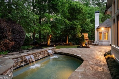 Tucked into a quiet cul-de-sac street within one of Suwanee's on Laurel Springs Golf Club in Georgia - for sale on GolfHomes.com, golf home, golf lot