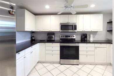 Golf Course Views, Minutes to the Beach - 3-Bedroom Corner Condo on Deer Creek Golf Club in Florida - for sale on GolfHomes.com, golf home, golf lot