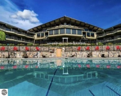 Stylish & spacious contemporary home overlooking popular Summit on Shanty Creek Golf Course in Michigan - for sale on GolfHomes.com, golf home, golf lot