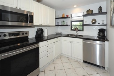 Golf Course Views, Minutes to the Beach - 3-Bedroom Corner Condo on Deer Creek Golf Club in Florida - for sale on GolfHomes.com, golf home, golf lot