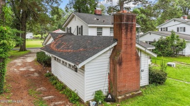 Enjoy quality time with loved ones in the spacious den, or host on Plymouth Country Club in North Carolina - for sale on GolfHomes.com, golf home, golf lot