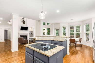 Come home to this beautifully maintained three-sided brick on The Golf Club of Georgia in Georgia - for sale on GolfHomes.com, golf home, golf lot