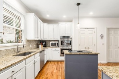 Come home to this beautifully maintained three-sided brick on The Golf Club of Georgia in Georgia - for sale on GolfHomes.com, golf home, golf lot