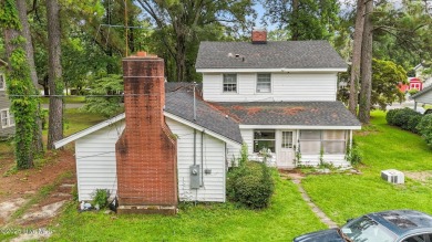 Enjoy quality time with loved ones in the spacious den, or host on Plymouth Country Club in North Carolina - for sale on GolfHomes.com, golf home, golf lot