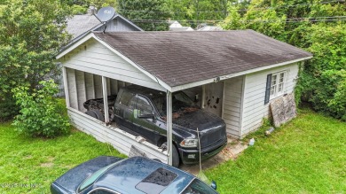 Enjoy quality time with loved ones in the spacious den, or host on Plymouth Country Club in North Carolina - for sale on GolfHomes.com, golf home, golf lot