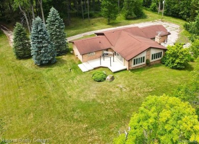 If peace, privacy and tranquility is what you crave with a on Copper Hills Golf and Country Club in Michigan - for sale on GolfHomes.com, golf home, golf lot