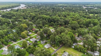 Enjoy quality time with loved ones in the spacious den, or host on Plymouth Country Club in North Carolina - for sale on GolfHomes.com, golf home, golf lot