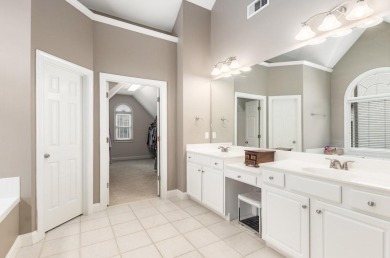 Come home to this beautifully maintained three-sided brick on The Golf Club of Georgia in Georgia - for sale on GolfHomes.com, golf home, golf lot