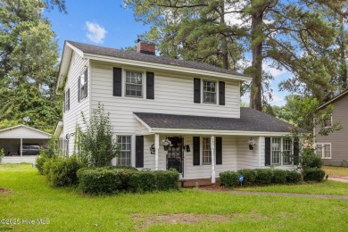 Enjoy quality time with loved ones in the spacious den, or host on Plymouth Country Club in North Carolina - for sale on GolfHomes.com, golf home, golf lot