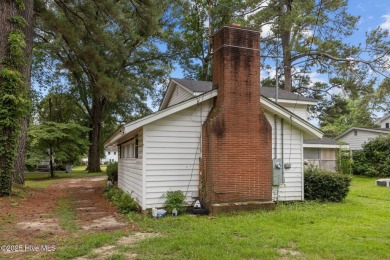 Enjoy quality time with loved ones in the spacious den, or host on Plymouth Country Club in North Carolina - for sale on GolfHomes.com, golf home, golf lot