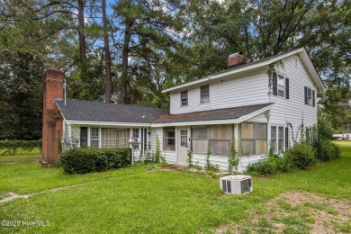 Enjoy quality time with loved ones in the spacious den, or host on Plymouth Country Club in North Carolina - for sale on GolfHomes.com, golf home, golf lot