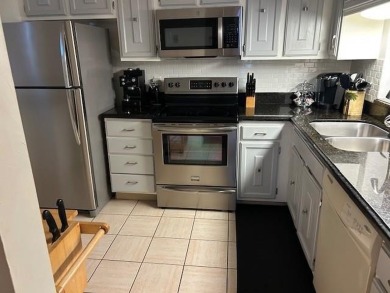 Beautiful views from this 2 bedrom, 2 bath condo Shutters on the on Inverrary Country Club in Florida - for sale on GolfHomes.com, golf home, golf lot