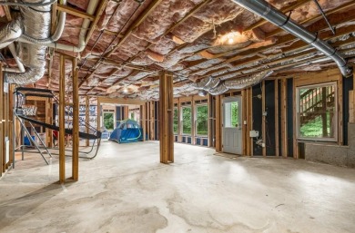 Come home to this beautifully maintained three-sided brick on The Golf Club of Georgia in Georgia - for sale on GolfHomes.com, golf home, golf lot