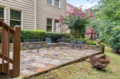 Come home to this beautifully maintained three-sided brick on The Golf Club of Georgia in Georgia - for sale on GolfHomes.com, golf home, golf lot