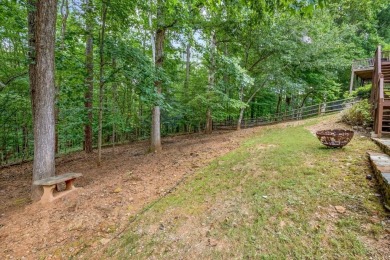 Come home to this beautifully maintained three-sided brick on The Golf Club of Georgia in Georgia - for sale on GolfHomes.com, golf home, golf lot