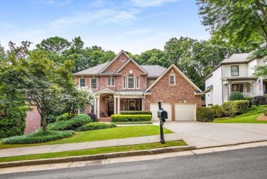 Come home to this beautifully maintained three-sided brick on The Golf Club of Georgia in Georgia - for sale on GolfHomes.com, golf home, golf lot