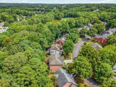 Come home to this beautifully maintained three-sided brick on The Golf Club of Georgia in Georgia - for sale on GolfHomes.com, golf home, golf lot