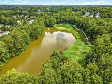 Come home to this beautifully maintained three-sided brick on The Golf Club of Georgia in Georgia - for sale on GolfHomes.com, golf home, golf lot