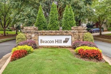 Come home to this beautifully maintained three-sided brick on The Golf Club of Georgia in Georgia - for sale on GolfHomes.com, golf home, golf lot