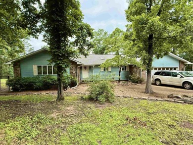 Welcome to your dream home sitting on just under 1 acre, nestled on Indian Hills Country Club in Arkansas - for sale on GolfHomes.com, golf home, golf lot