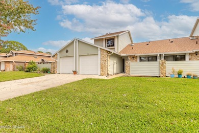 Welcome to this inviting 3-bedroom, 2.5-bathroom townhome on The Club At Pelican Bay - North Course in Florida - for sale on GolfHomes.com, golf home, golf lot