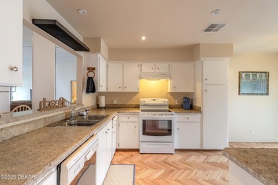 Welcome to this inviting 3-bedroom, 2.5-bathroom townhome on The Club At Pelican Bay - North Course in Florida - for sale on GolfHomes.com, golf home, golf lot