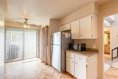 Welcome to this inviting 3-bedroom, 2.5-bathroom townhome on The Club At Pelican Bay - North Course in Florida - for sale on GolfHomes.com, golf home, golf lot