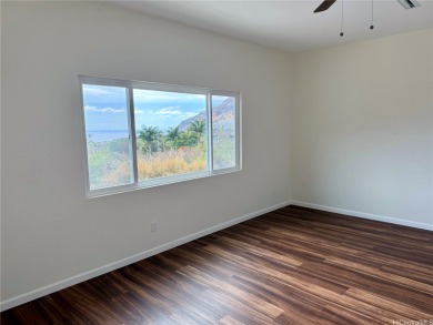Nestled on a scenic hilltop, this exquisite 2024-built home on Makaha Valley Country Club in Hawaii - for sale on GolfHomes.com, golf home, golf lot