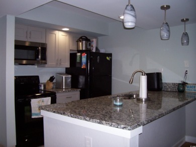 Sands Ocean Club Unit 619 is a 2 bedroom 2 bath unit that faces on The Dunes Golf and Beach Club in South Carolina - for sale on GolfHomes.com, golf home, golf lot