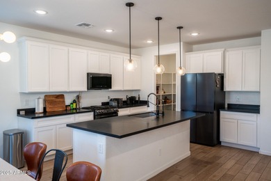 LOWEST-PRICED HOME IN THE AREA! Discover elevated desert living on Verrado Golf Club  in Arizona - for sale on GolfHomes.com, golf home, golf lot