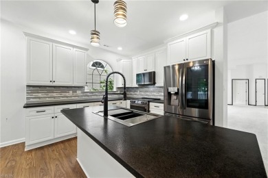 Welcome to this stunning 3- bedroom, 2-bath home that on Kiln Creek Golf and Country Club in Virginia - for sale on GolfHomes.com, golf home, golf lot