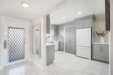 Bright 2-bed, 2-bath condo in Sunrise Lakes 55+ community on Sunrise Lakes Phase III in Florida - for sale on GolfHomes.com, golf home, golf lot