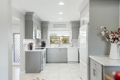 Bright 2-bed, 2-bath condo in Sunrise Lakes 55+ community on Sunrise Lakes Phase III in Florida - for sale on GolfHomes.com, golf home, golf lot