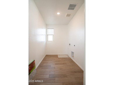 LOWEST-PRICED HOME IN THE AREA! Discover elevated desert living on Verrado Golf Club  in Arizona - for sale on GolfHomes.com, golf home, golf lot