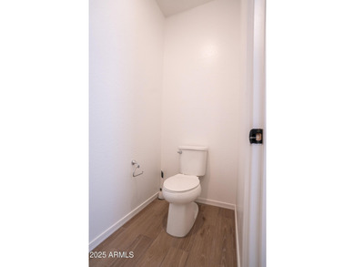 LOWEST-PRICED HOME IN THE AREA! Discover elevated desert living on Verrado Golf Club  in Arizona - for sale on GolfHomes.com, golf home, golf lot