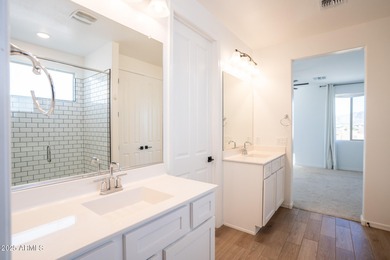 LOWEST-PRICED HOME IN THE AREA! Discover elevated desert living on Verrado Golf Club  in Arizona - for sale on GolfHomes.com, golf home, golf lot